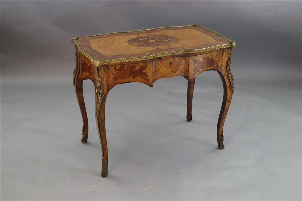 A late 19th century French ormolu mounted walnut, rosewood and marquetry writing table, W.3ft 1in. D.1ft 9in. H.2ft 6in.